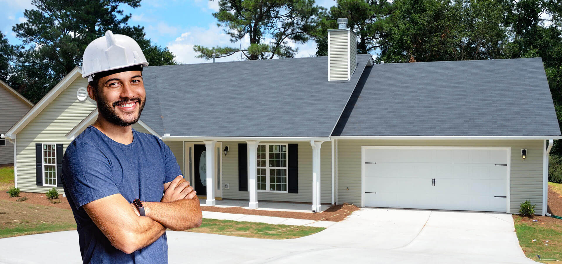 A Construction Worker Man Smiling Next To A House With A New Roof - Residential Solar Roofing Nashville - Music City Solar Solutions 2306 Eugenia Ave Suite A Nashville TN 37211 (615) 692-1602